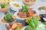 Dinning table filled with different mezze.